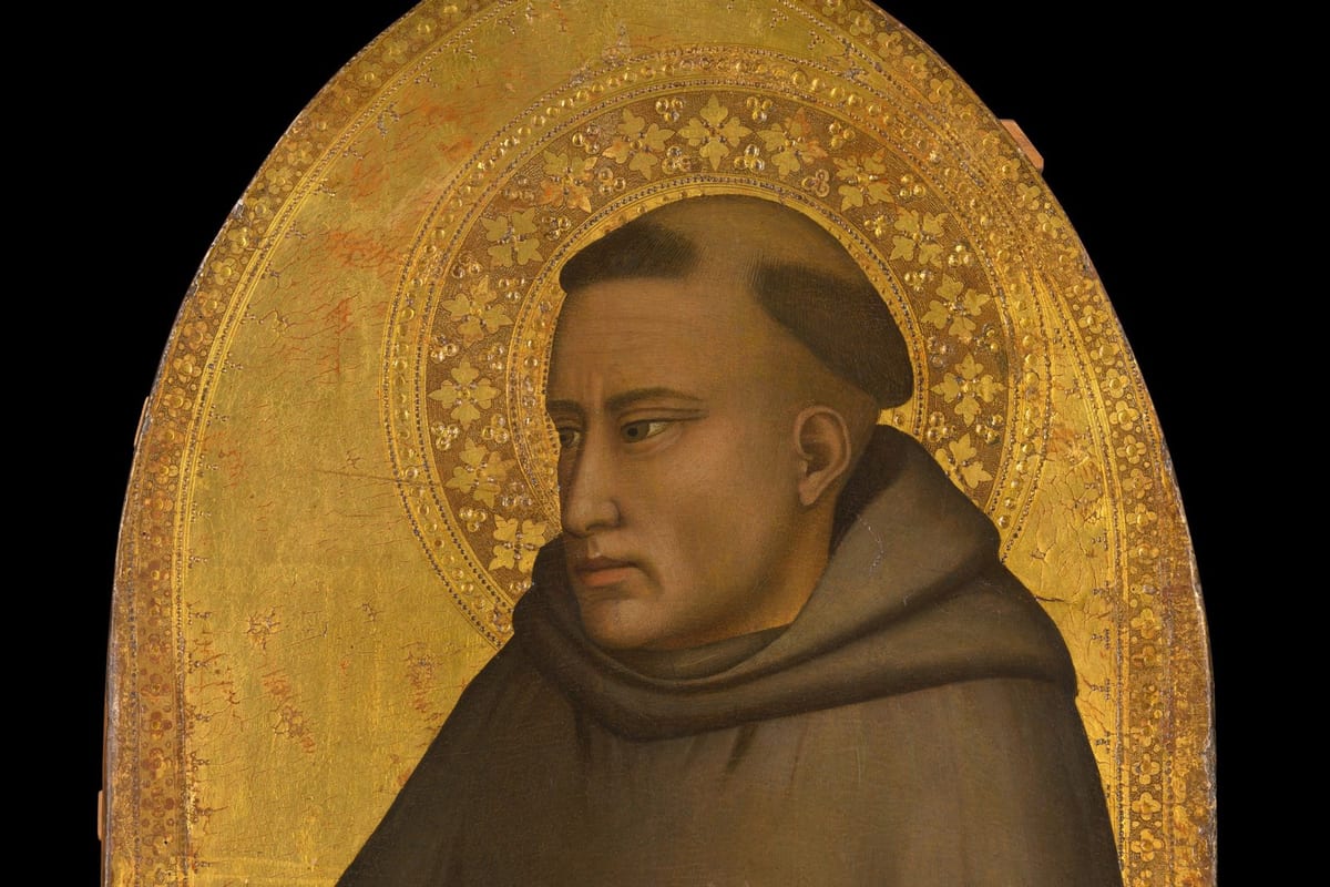A head-and-shoulders panel painting of St. Anthony of Padua, tonsured and wearing a brown Franciscan habit, set against a gold background with an ornamented halo.