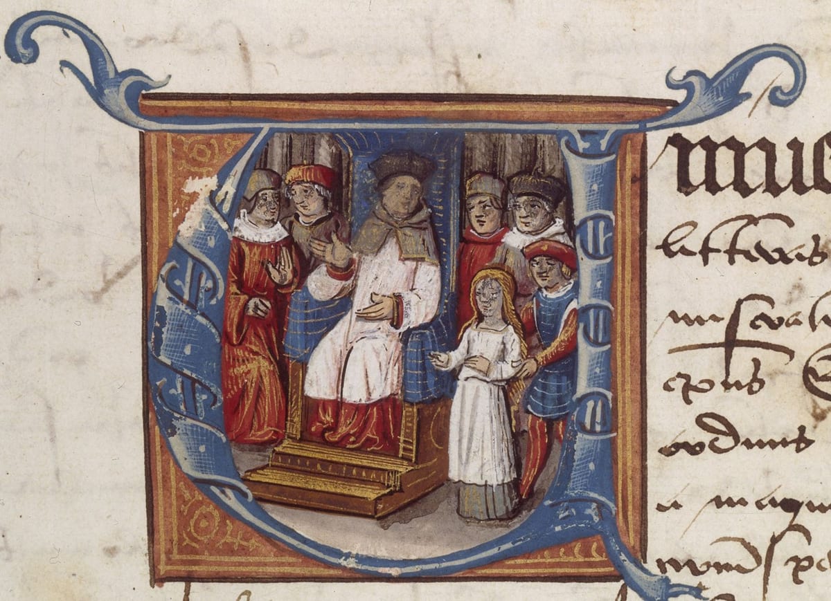A medieval illuminated manuscript initial showing a young woman in a plain white dress standing before a seated bishop in white and gold vestments, flanked by robed churchmen and guards in red and blue.