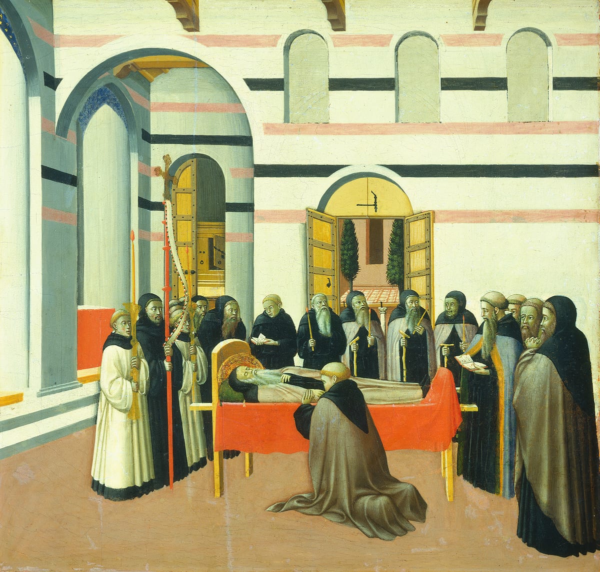 A painted panel shows St. Anthony laid out in death with the monks gathered around him.