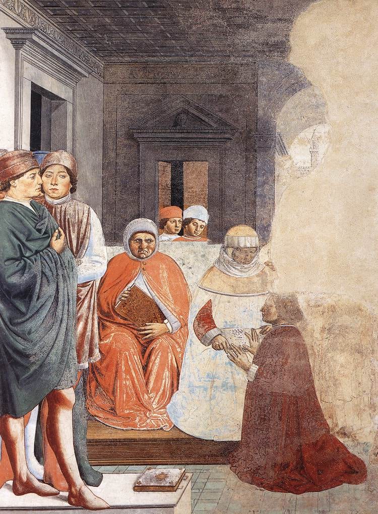 A lean young student in a belted tunic and cloak listens to a lecture among other students in a colonnaded hall.