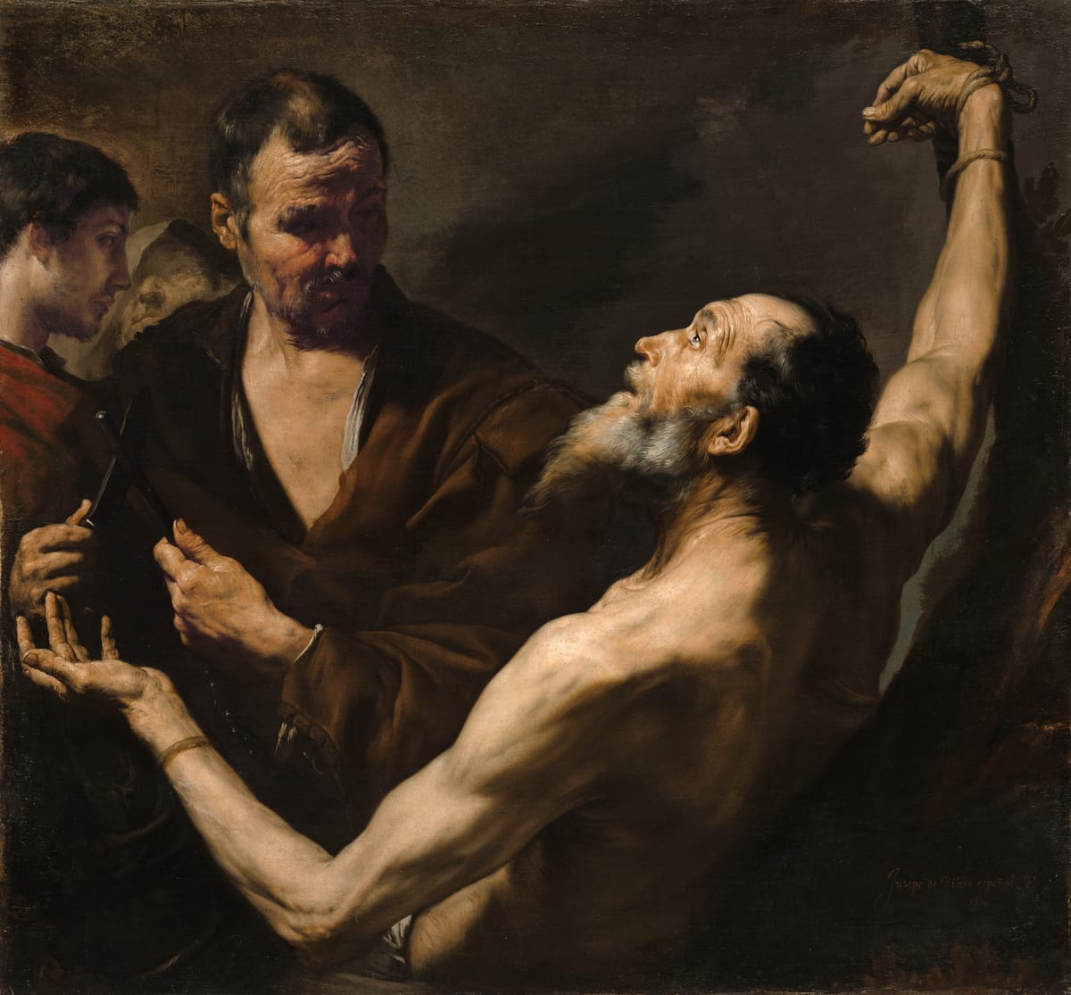A painting of the apostle stripped to the waist and hauled upright by ropes at his wrists, while his executioners work in shadow at the edges of the canvas.