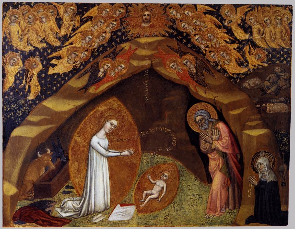 A painted panel shows Our Lady kneeling in a gold mandorla before the Child lying on the ground of a rocky cave under a starry sky full of gold angels.