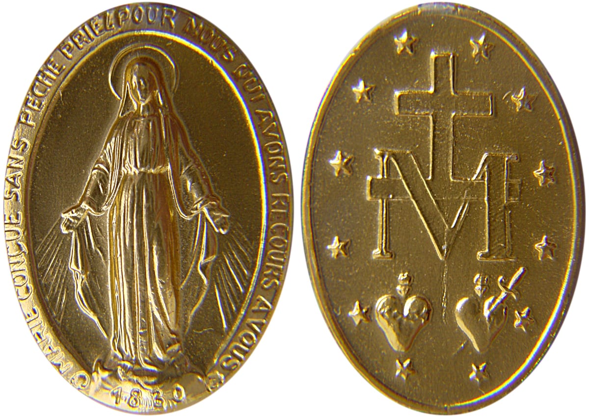 Both faces of the Miraculous Medal, struck to the model shown to her on November 27, 1830 AD.