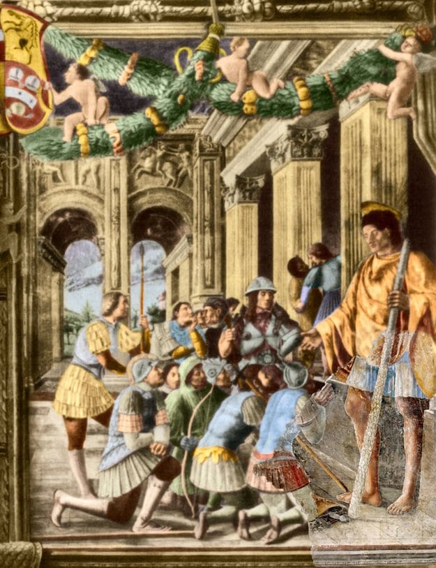 A fresco showing a towering, robed man holding a long staff standing before a colonnaded building, with a kneeling crowd of armored soldiers and courtiers gathered before him, a coat of arms and garland decorating the border above.