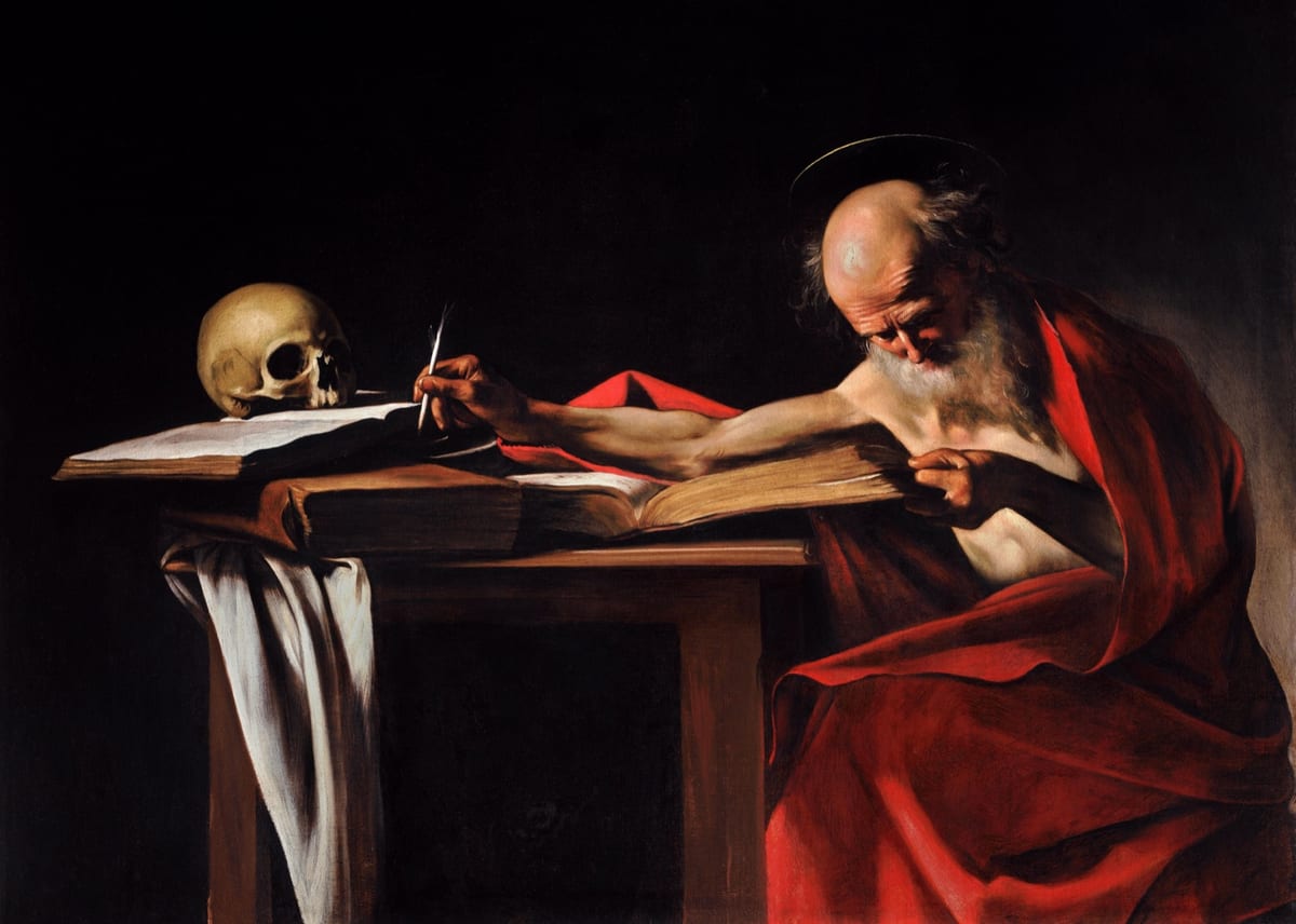 Caravaggio's painting shows the aged, bald St. Jerome reading a large open book and reaching for his inkwell, with a skull on the books across the table.