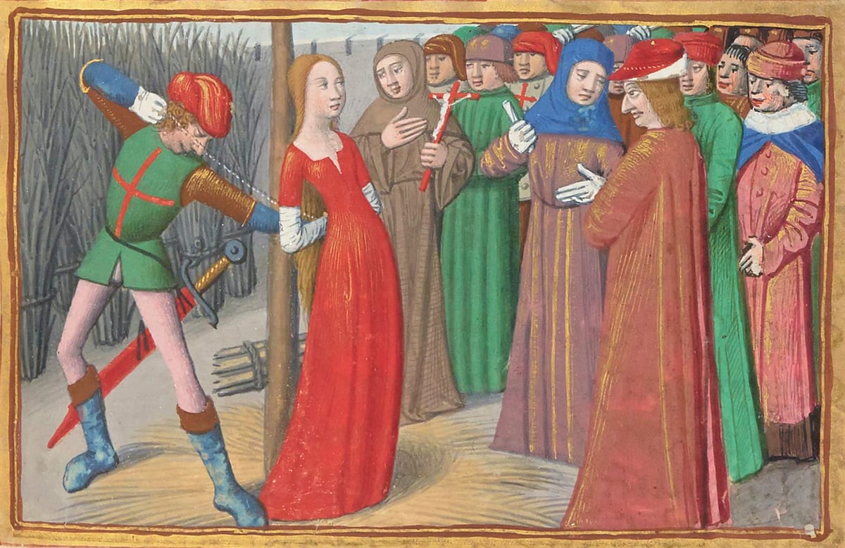 A manuscript illumination shows St. Joan bound to a high plastered pillar on a pyre in the Old Market at Rouen, with the executioner, English soldiers, the judges and the crowd around her.