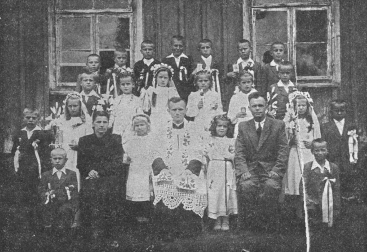 A black-and-white photograph shows St. John Paul II as curate of the country parish of Niegowić in 1948 AD.