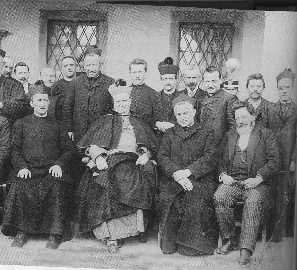 Bishop Giacomo Maria Radini Tedeschi of Bergamo with his household about 1910 AD, his secretary third in the second row.