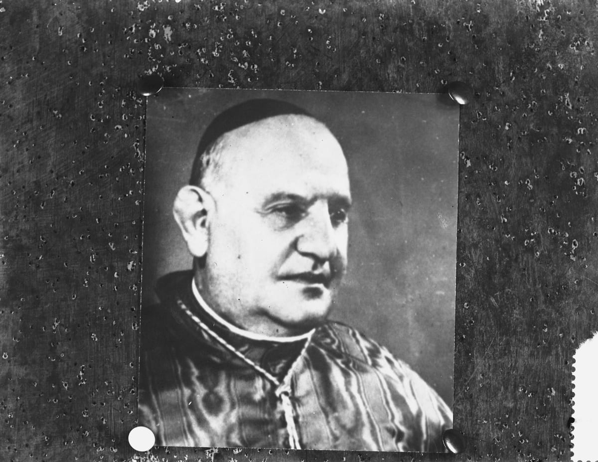 A black-and-white portrait photograph of St. John XXIII, then Cardinal Roncalli, Patriarch of Venice, in a cardinal's cassock and skullcap.