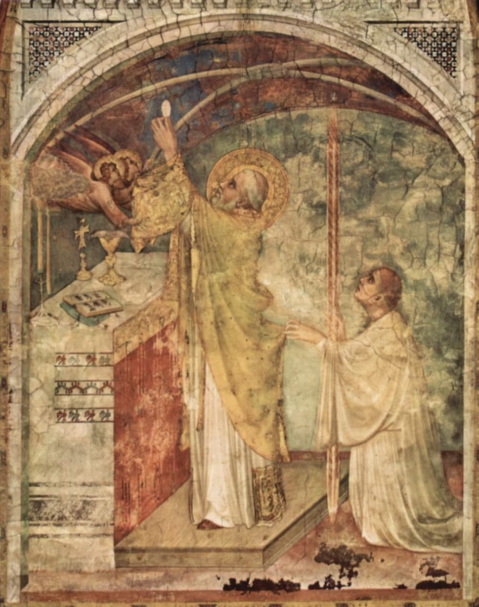 A fresco of an elderly, halo-crowned bishop in gold vestments standing at an altar, one hand raised toward a hovering angel offering a bishop's mitre, while a tonsured monk kneels beside him holding a tall cross.