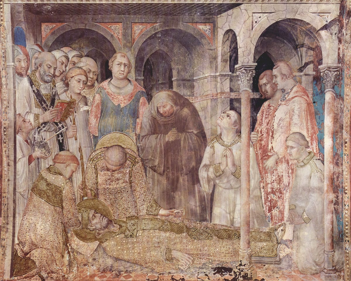 A gaunt old man with white hair and a short white beard lies on his back with his hands crossed, a semicircle of clergy and monks bending over him.