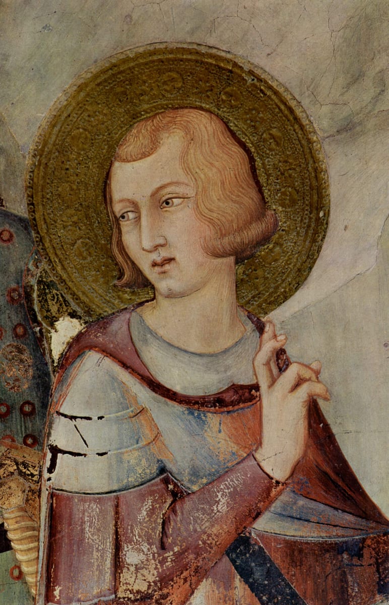 A beardless man in a plain robe stands full length and unarmed against a bare ground, his hands crossed at his breast.