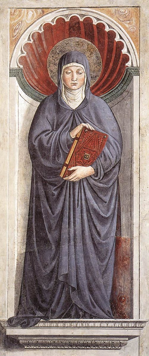 St. Monica stands alone at full length on a chapel pillar, a single robed figure with no scene around her.
