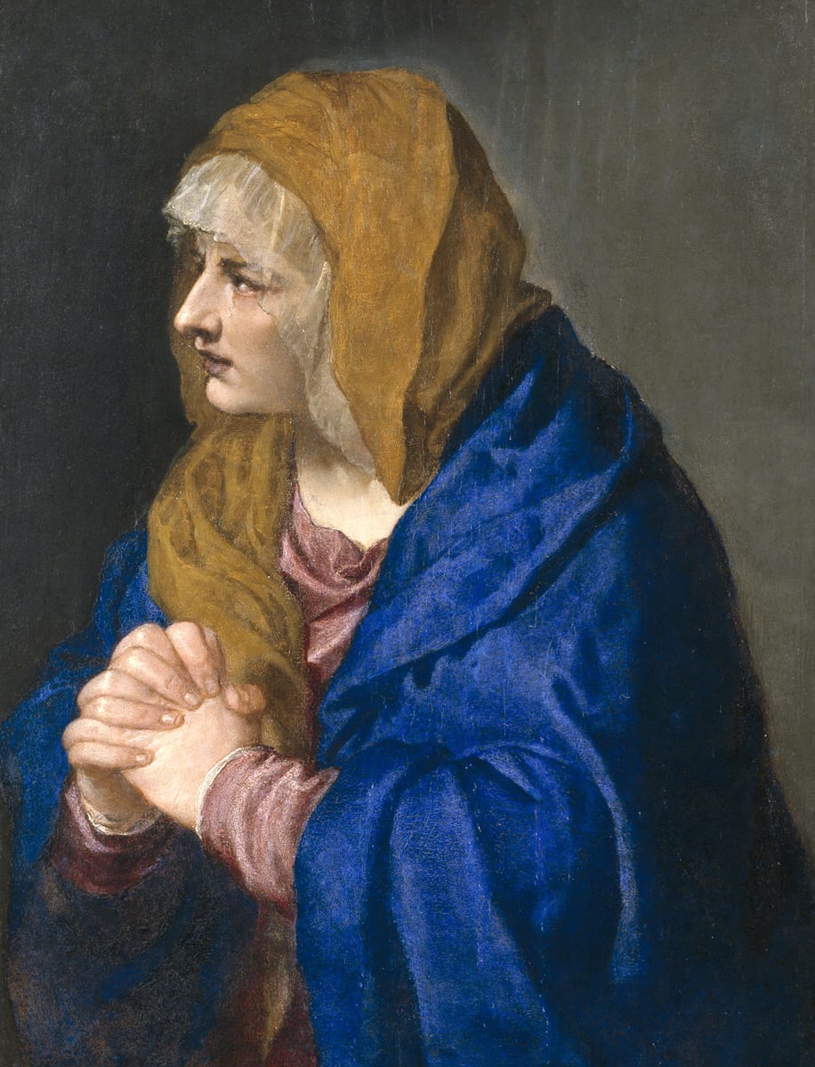 The Blessed Virgin Mary alone against a dark ground, hands clasped before her, in a blue mantle drawn over her head and a white veil, her eyes lowered and her face wet.