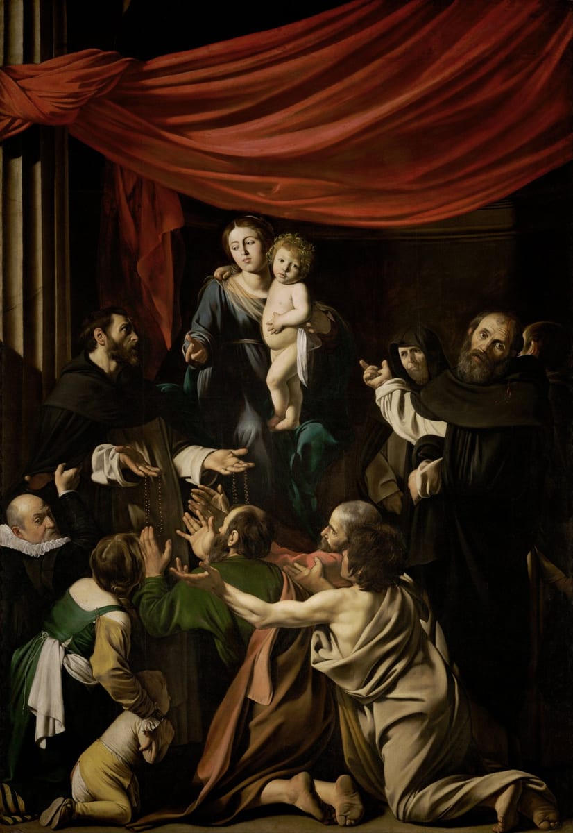 Caravaggio's Madonna of the Rosary: under a great red curtain Our Lady, seated with the Child standing on her knee, points as St. Dominic in black and white hands rosaries down to kneeling poor men who reach up; St. Peter Martyr at the right, a donor in a ruff at the left.