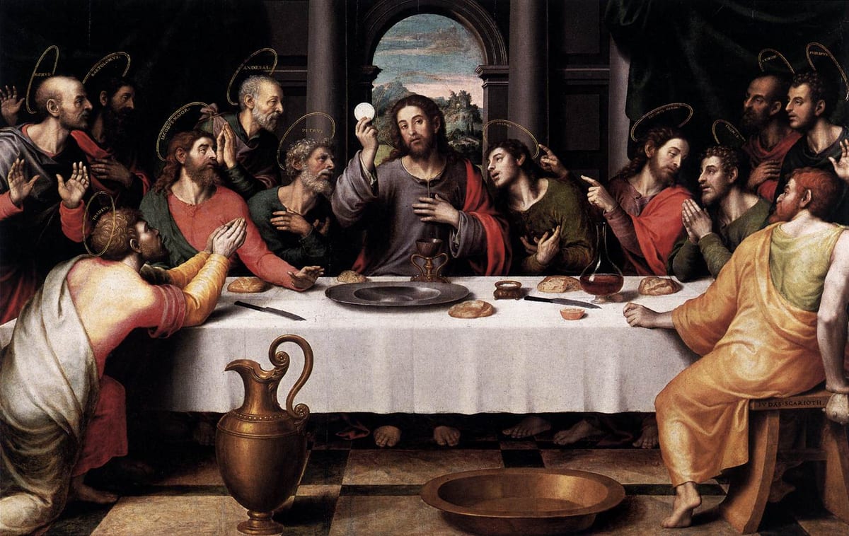 Juan de Juanes's Last Supper: Christ at the centre of a long white table raises the Host, a chalice before him, the twelve apostles with their names on their haloes around him; Judas sits at the right with his back turned.