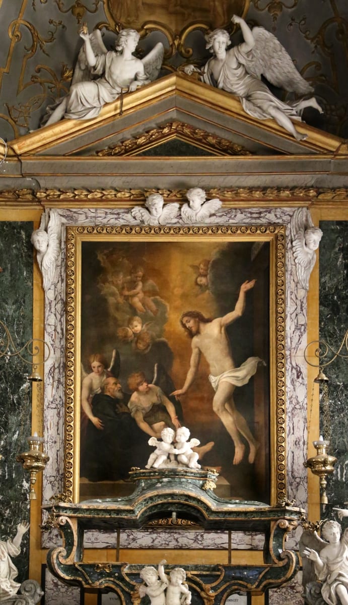 Christ leans down from the Cross toward the bared right leg of St. Peregrine, who is shown at about sixty in the black Servite habit.