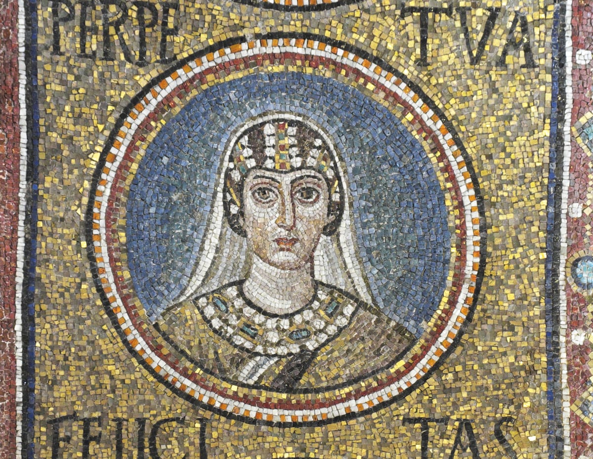 A mosaic medallion showing the head and shoulders of a young woman, frontal, inside a ring on a gold ground.