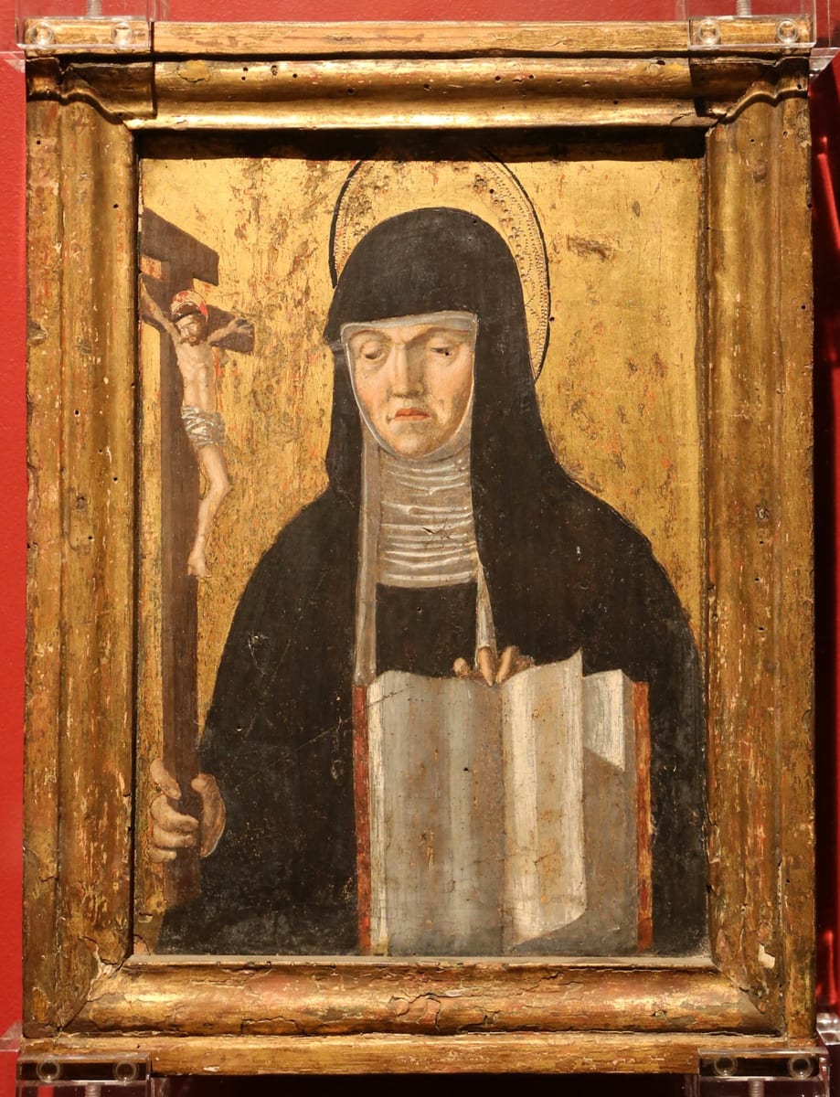 A half-length painting of a veiled nun in a black habit and white wimple, haloed, gazing downward while holding a small crucifix in one hand and resting the other on an open book.