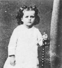 A studio photograph of St. Thérèse at three and a half years old, made at Alençon in July 1876 AD.